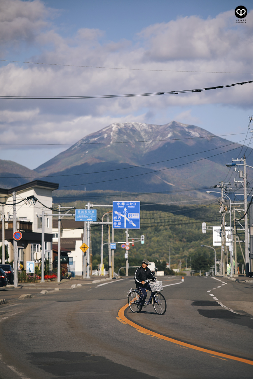 heartpatrick travel photography photojournalism hokkaido japan street rankoshi old man on bicycle