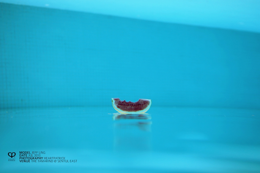 heartpatrick underwater male portrait watermelon conceptual