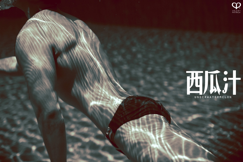 heartpatrick underwater male portrait watermelon conceptual