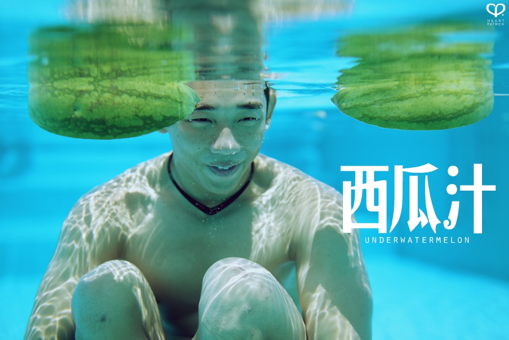 heartpatrick underwater male portrait watermelon conceptual