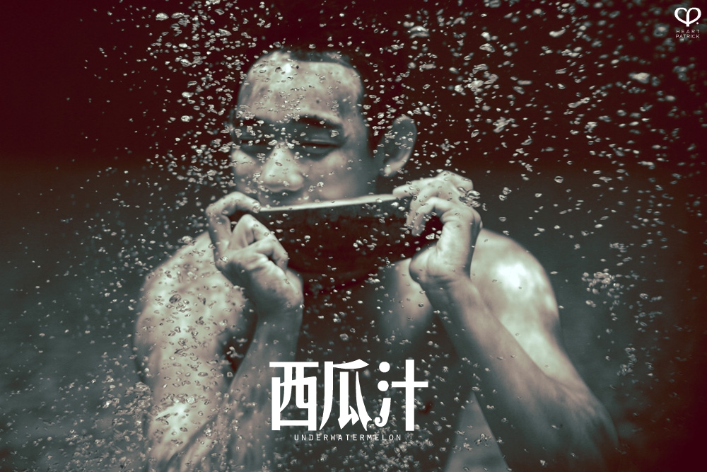 heartpatrick underwater male portrait watermelon conceptual