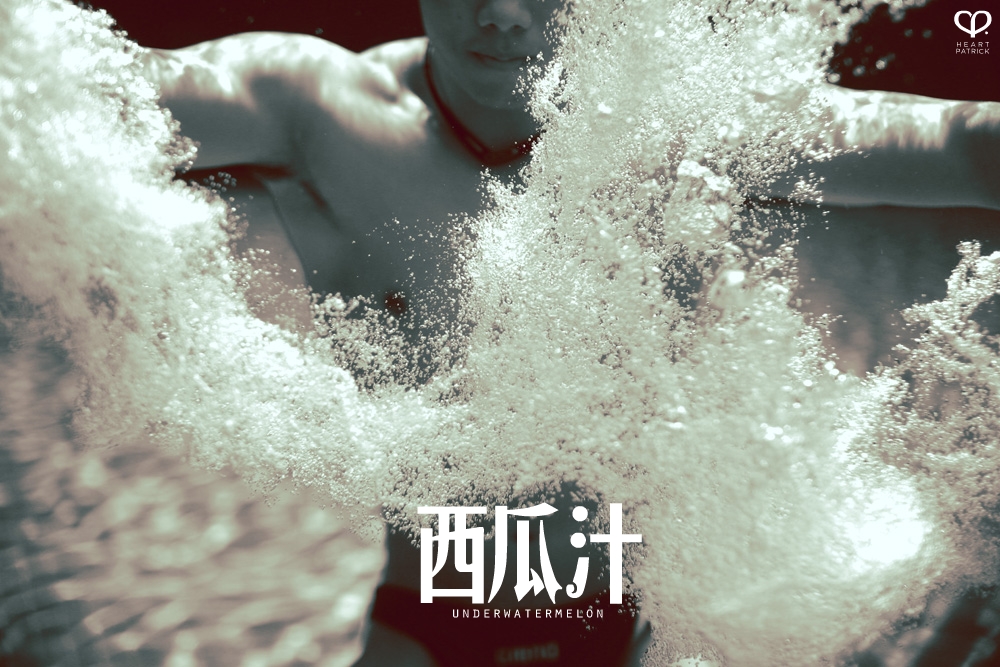 heartpatrick underwater male portrait watermelon conceptual