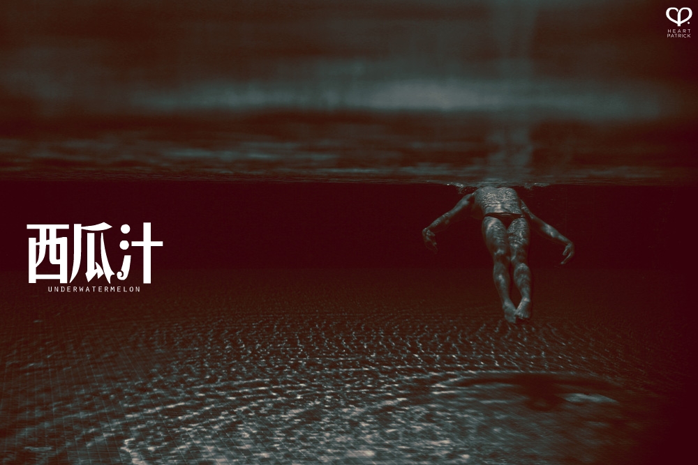 heartpatrick underwater male portrait watermelon conceptual